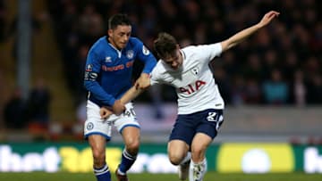 ROCHDALE, ENGLAND - FEBRUARY 18: Juan Foyth of Tottenham Hotspur is challenged by Ian Henderson of Rochdale AFC during The Emirates FA Cup Fifth Round match between Rochdale and Tottenham Hotspur on February 18, 2018 in Rochdale, United Kingdom. (Photo by Nigel Roddis/Getty Images)