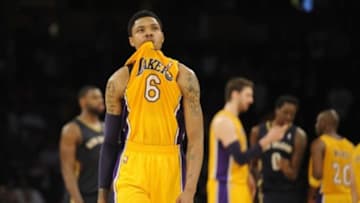 Mar 4, 2014; Los Angeles, CA, USA; Los Angeles Lakers guard Kent Bazemore (6) reacts after missing a shot against the New Orleans Pelicans during the fourth quarter at Staples Center. The New Orleans Pelicans defeated the Los Angeles Lakers 132-125. Mandatory Credit: Kelvin Kuo-USA TODAY Sports