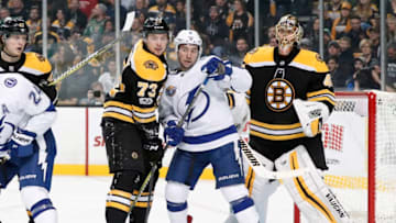 BOSTON, MA - NOVEMBER 29: Boston Bruins right defenseman Charlie McAvoy (73) tries to keep Tampa Bay Lightning center Tyler Johnson (9) busy in front of Boston Bruins goalie Tuukka Rask (40) during a game between the Boston Bruins and the Tampa Bay Lightning on November 29, 2017, at TD Garden in Boston, Massachusetts. The Bruins defeated the Lightning 3-2. (Photo by Fred Kfoury III/Icon Sportswire via Getty Images)