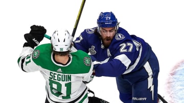 EDMONTON, ALBERTA - SEPTEMBER 21: Ryan McDonagh #27 of the Tampa Bay Lightning checks Tyler Seguin #91 of the Dallas Stars during the third period in Game Two of the 2020 NHL Stanley Cup Final at Rogers Place on September 21, 2020 in Edmonton, Alberta, Canada. (Photo by Bruce Bennett/Getty Images)
