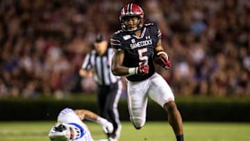 COLUMBIA, SC - SEPTEMBER 28: Rico Dowdle #5 of the South Carolina Gamecocks rushes for a 30 yard touchdown during the second half of a game against the Kentucky Wildcats at Williams-Brice Stadium on September 28, 2019 in Columbia, South Carolina. (Photo by Carmen Mandato/Getty Images)