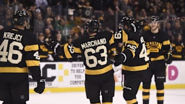 Dec 10, 2016; Boston, MA, USA; Boston Bruins left wing Brad Marchand (63) celebrates with teammates after scoring a goal during the second period against the Toronto Maple Leafs at TD Garden. Mandatory Credit: Bob DeChiara-USA TODAY Sports