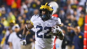 Oct 8, 2016; Piscataway, NJ, USA; Michigan Wolverines running back Karan Higdon (22) runs for a touchdown during the second half at High Points Solutions Stadium. Michigan defeated Rutgers 78-0. Mandatory Credit: Ed Mulholland-USA TODAY Sports