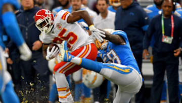 MEXICO CITY, MEXICO - NOVEMBER 18: LeSean McCoy #25 of the Kansas City Chiefs spins out of Thomas Davis #58 of the Los Angeles Chargers tackle during an NFL football game on Monday, November 18, 2019, in Mexico City. The Chiefs defeated the Chargers 24-17. (Photo by Alika Jenner/Getty Images)