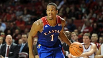 Jan 8, 2014; Norman, OK, USA; Kansas Jayhawks guard Wayne Selden, Jr. (1) handles the ball against the Oklahoma Sooners during the first half at Lloyd Noble Center. Mandatory Credit: Mark D. Smith-USA TODAY Sports
