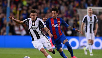 Juventus' Argentinian forward Paulo Dybala (L) vies with Barcelona's Brazilian forward Neymar during the UEFA Champions League quarter-final second leg football match FC Barcelona vs Juventus at the Camp Nou stadium in Barcelona on April 19, 2017. / AFP PHOTO / Josep LAGO (Photo credit should read JOSEP LAGO/AFP via Getty Images)