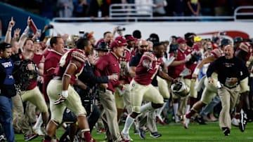 MIAMI GARDENS, FL - DECEMBER 30: Head coach Jimbo Fisher of the Florida State Seminoles celebrates their 33 to 32 win over the Michigan Wolverines during the Capitol One Orange Bowl at Sun Life Stadium on December 30, 2016 in Miami Gardens, Florida. (Photo by Chris Trotman/Getty Images)