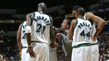 07 Jan 2002: Coach Flip Saunders of the Minnesota Timberwolves gives his team some last minute instructions prior to the fourth quarter against the Detroit Pistons at Target Center in Minneapolis, Minnesota. DIGITAL IMAGE NOTICE TO USER: User expressly acknowledges and agrees that, by downloading and/or using this Photograph, user is consenting to the terms and conditions of the Getty Images License Agreement. Mandatory Copyright notice: Copyright 2002 NBAE Mandatory Credit: David Sherman/NBAE/Getty Images