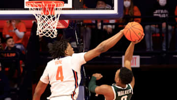 CHAMPAIGN, ILLINOIS - JANUARY 25: Omar Payne #4 of the Illinois Fighting Illini blocks the shot of Tyson Walker #2 of the Michigan State Spartans during the first half at State Farm Center on January 25, 2022 in Champaign, Illinois. (Photo by Justin Casterline/Getty Images)