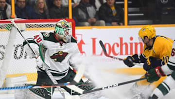 Dec 15, 2016; Nashville, TN, USA; Minnesota Wild goalie Devan Dubnyk (40) makes a save against Nashville Predators center Colton Sissons (10) during the first period at Bridgestone Arena. Mandatory Credit: Christopher Hanewinckel-USA TODAY Sports