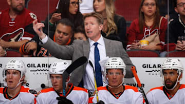 GLENDALE, AZ - OCTOBER 15: Head coach Dave Hakstol of the Philadelphia Flyers reacts on the bench during the second period of the NHL game against Arizona Coyotes at Gila River Arena on October 15, 2016 in Glendale, Arizona. (Photo by Christian Petersen/Getty Images)