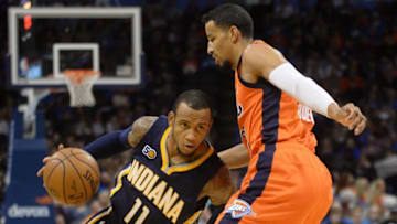 Nov 20, 2016; Oklahoma City, OK, USA; Indiana Pacers guard Monta Ellis (11) drives to the basket in front of Oklahoma City Thunder forward Andre Roberson (21) during the first quarter at Chesapeake Energy Arena. Mandatory Credit: Mark D. Smith-USA TODAY Sports