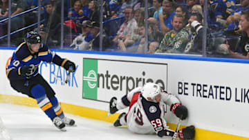 ST. LOUIS, MO - SEPTEMBER 20: Columbus Blue Jackets defenseman Ryan Collins (59) trips while going after the puck during a pre-season National Hockey League game between the Columbus Blue Jackets and the St. Louis Blues on September 20, 2017, at Scottrade Center in St. Louis, MO. (Photo by Keith Gillett/Icon Sportswire via Getty Images)