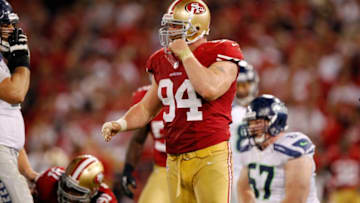 SAN FRANCISCO, CA - OCTOBER 18: Defensive tackle Justin Smith #94 of the San Francisco 49ers reacts after disrupting the Seattle Seahawks offense in the fourth quarter on October 18, 2012 at Candlestick Park in San Francisco, California. The 49ers won 13-6. (Photo by Brian Bahr/Getty Images)