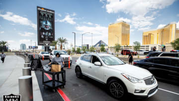 A members of Silver and Black Hospitality loads food into a fan car as part of the the Las Vegas Raiders “Gameday to Go” program before the Raiders regular season home game against the New Orleans Saints at Allegiant Stadium, Monday, September 21, 2020, in Las Vegas, Nev.The Las Vegas Raiders won 34-24. Photo provided by Levy Restaurants