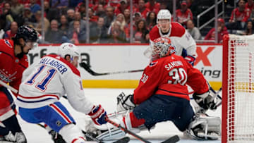WASHINGTON, DC - NOVEMBER 15: Nick Suzuki #14 of the Montreal Canadiens scores a goal against Ilya Samsonov #30 of the Washington Capitals in the second period at Capital One Arena on November 15, 2019 in Washington, DC. (Photo by Patrick McDermott/NHLI via Getty Images)