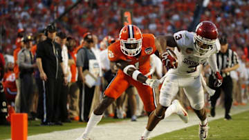 Dec 31, 2015; Miami Gardens, FL, USA; Oklahoma Sooners wide receiver Sterling Shepard (3) tries to pull away from Clemson Tigers safety Jayron Kearse (1) in the second quarter of the 2015 CFP Semifinal at the Orange Bowl at Sun Life Stadium. Mandatory Credit: Kim Klement-USA TODAY Sports