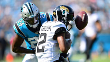 CHARLOTTE, NORTH CAROLINA - OCTOBER 06: James Bradberry #24 of the Carolina Panthers breaks up a pass intended for Dede Westbrook #12 of the Jacksonville Jaguars during the first half of their game at Bank of America Stadium on October 06, 2019 in Charlotte, North Carolina. (Photo by Jacob Kupferman/Getty Images)