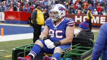 Oct 18, 2015; Orchard Park, NY, USA; Buffalo Bills defensive tackle Kyle Williams (95) gets taken off the field with a injury during the second half against the Cincinnati Bengals at Ralph Wilson Stadium. Bengals beat the Bills 34 to 21. Mandatory Credit: Timothy T. Ludwig-USA TODAY Sports