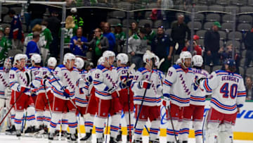 Mar 12, 2022; Dallas, Texas, USA; The New York Rangers celebrate the win over the Dallas Stars at the American Airlines Center. Mandatory Credit: Jerome Miron-USA TODAY Sports