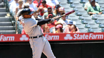 Jun 20, 2021; Anaheim, California, USA; Detroit Tigers second baseman Jonathan Schoop (7) hits a double against the Los Angeles Angels during the third inning at Angel Stadium. Mandatory Credit: Richard Mackson-USA TODAY Sports