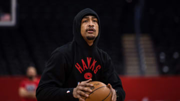 WASHINGTON, DC - MARCH 04: John Collins #20 of the Atlanta Hawks warms up before the game against the Washington Wizards at Capital One Arena on March 4, 2022 in Washington, DC. NOTE TO USER: User expressly acknowledges and agrees that, by downloading and or using this photograph, User is consenting to the terms and conditions of the Getty Images License Agreement. (Photo by Scott Taetsch/Getty Images)