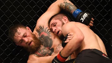 Las Vegas , United States - 6 October 2018; Conor McGregor, left, and Khabib Nurmagomedov in their UFC lightweight championship fight during UFC 229 at T-Mobile Arena in Las Vegas, Nevada, USA. (Photo By Stephen McCarthy/Sportsfile via Getty Images)