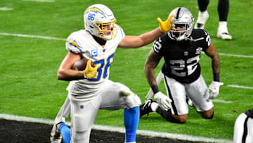 LAS VEGAS, NEVADA - DECEMBER 17: Hunter Henry #86 of the Los Angeles Chargers celebrates after scoring a 10 yard touchdown against the Las Vegas Raiders during the first half of the game at Allegiant Stadium on December 17, 2020 in Las Vegas, Nevada. (Photo by Chris Unger/Getty Images)