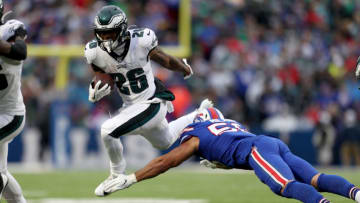 ORCHARD PARK, NEW YORK - OCTOBER 27: Miles Sanders #26 of the Philadelphia Eagles runs the ball as Matt Milano #58 of the Buffalo Bills attempts to tackle him during the third quarter of an NFL game at New Era Field on October 27, 2019 in Orchard Park, New York. (Photo by Bryan M. Bennett/Getty Images)