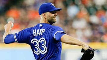 HOUSTON, TX - JUNE 25: J.A. Happ #33 of the Toronto Blue Jays pitches in the first inning against the Houston Astros at Minute Maid Park on June 25, 2018 in Houston, Texas. (Photo by Bob Levey/Getty Images)