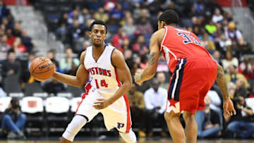Dec 16, 2016; Washington, DC, USA; Detroit Pistons guard Ish Smith (14) passes the ball as Washington Wizards guard Trey Burke (33) defends during the first half at Verizon Center. Mandatory Credit: Brad Mills-USA TODAY Sports