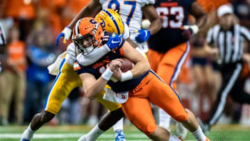 SYRACUSE, NY - OCTOBER 18: Clayton Welch #11 of the Syracuse Orange is brought down by Jazzee Stocker #7 of the Pittsburgh Panthers on a first down quarterback keeper during the second quarter at the Carrier Dome on October 18, 2019 in Syracuse, New York. (Photo by Brett Carlsen/Getty Images)