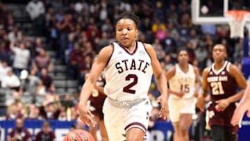NASHVILLE, TN - MARCH 03: Mississippi State Lady Bulldogs guard Morgan William (2) ;usher the ball on a fast break against the Texas A