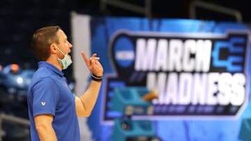 INDIANAPOLIS, INDIANA - MARCH 19: Head coach Mike White of the Florida Gators communicates with the team as they take on the Virginia Tech Hokies in the first half of the first round game of the 2021 NCAA Men's Basketball Tournament at Hinkle Fieldhouse on March 19, 2021 in Indianapolis, Indiana. (Photo by Andy Lyons/Getty Images)