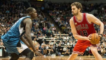 Feb 6, 2016; Minneapolis, MN, USA; Chicago Bulls center Pau Gasol (16) is defended by Minnesota Timberwolves center Gorgui Dieng (5) during the second half at Target Center. Minnesota won 112-105. Mandatory Credit: Jeffrey Becker-USA TODAY Sports