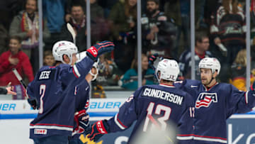 AUGSBURG, GERMANY - NOVEMBER 11: Dylan Reese of USA, Ryan Gunderson of USA and Jonathan Blum of USA celebrate thier team`s second goal during the Deutschland Cup 2017 match between Russia and USA at Curt-Frenzel-Stadion on November 11, 2017 in Augsburg, Germany. (Photo by TF-Images/TF-Images via Getty Images)