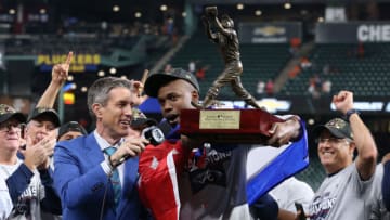 Nov 2, 2021; Houston, TX, USA; Atlanta Braves designated hitter Jorge Soler receives the World Series MVP trophy after defeating the Houston Astros in game six of the 2021 World Series at Minute Maid Park. Mandatory Credit: Troy Taormina-USA TODAY Sports