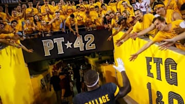 Sep 10, 2016; Tempe, AZ, USA; Arizona State Sun Devils fans in the student section cheer for running back Kalen Ballage (7) as he leaves the field following the game against the Texas Tech Red Raiders at Sun Devil Stadium. Ballage scored eight touchdowns to tie an NCAA record. Mandatory Credit: Mark J. Rebilas-USA TODAY Sports