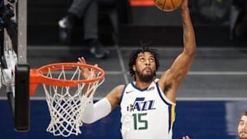 MINNEAPOLIS, MINNESOTA - APRIL 26: Derrick Favors #15 of the Utah Jazz rebounds the ball against the Minnesota Timberwolves during the third quarter of the game at Target Center on April 26, 2021 in Minneapolis, Minnesota. The Timberwolves defeated the Jazz 105-104. NOTE TO USER: User expressly acknowledges and agrees that, by downloading and or using this Photograph, user is consenting to the terms and conditions of the Getty Images License Agreement (Photo by Hannah Foslien/Getty Images)