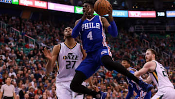 Dec 29, 2016; Salt Lake City, UT, USA; Philadelphia 76ers forward Nerlens Noel (4) tries to shoot the ball while being guarded by Utah Jazz center Rudy Gobert (27) during the first quarter at Vivint Smart Home Arena. Mandatory Credit: Chris Nicoll-USA TODAY Sports