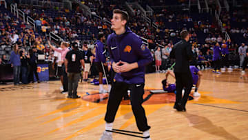 PHOENIX, AZ - OCTOBER 20: Dragan Bender #35 of the Phoenix Suns stretches prior to the game against the Los Angeles Lakers on October 20, 2017 at Talking Stick Resort Arena in Phoenix, Arizona. NOTE TO USER: User expressly acknowledges and agrees that, by downloading and or using this photograph, user is consenting to the terms and conditions of the Getty Images License Agreement. Mandatory Copyright Notice: Copyright 2017 NBAE (Photo by Michael Gonzales/NBAE via Getty Images)