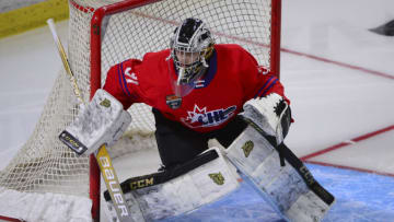 Jan 25, 2023; Langley, BC, CANADA; CHL Top Prospects team red goaltender Carson Bjarnason (31) watches play against CHL Top Prospects team white during the first period in the 2023 CHL Top Prospects ice hockey game at Langley Events Centre. Mandatory Credit: Anne-Marie Sorvin-USA TODAY Sports