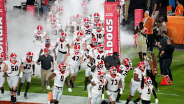 MIAMI GARDENS, FLORIDA - DECEMBER 31: Georgia Bulldogs take the field during introductions prior to the game against the Michigan Wolverines during the Capital One Orange Bowl for the College Football Playoff semifinal game at Hard Rock Stadium on December 31, 2021 in Miami Gardens, Florida. (Photo by Mark Brown/Getty Images)