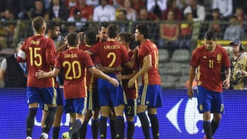 Spain's David Silva celebrate with teammates after scoring during the friendly football match between Belgium and Spain, at the King Baudouin Stadium, on September 1, 2016 in Brussels. / AFP / JOHN THYS (Photo credit should read JOHN THYS/AFP/Getty Images)