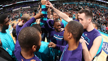 CHARLOTTE, NC - DECEMBER 31: The Charlotte Hornets huddle up before the game against the Cleveland Cavaliers on December 31, 2016 at Spectrum Center in Charlotte, North Carolina. NOTE TO USER: User expressly acknowledges and agrees that, by downloading and or using this photograph, User is consenting to the terms and conditions of the Getty Images License Agreement. Mandatory Copyright Notice: Copyright 2016 NBAE (Photo by Kent Smith/NBAE via Getty Images)