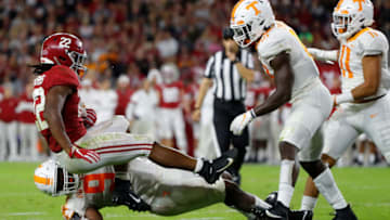 TUSCALOOSA, ALABAMA - OCTOBER 19: Najee Harris #22 of the Alabama Crimson Tide is tackled by Darel Middleton #97 of the Tennessee Volunteers in the second half at Bryant-Denny Stadium on October 19, 2019 in Tuscaloosa, Alabama. (Photo by Kevin C. Cox/Getty Images)