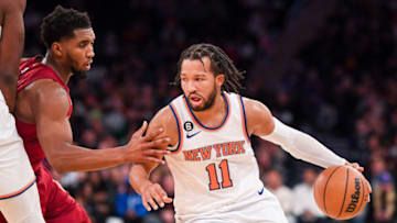 Dec 4, 2022; New York, New York, USA; New York Knicks guard Jalen Brunson (11) drives on Cleveland Cavaliers guard Donovan Mitchell (45) during the fourth quarter at Madison Square Garden. Mandatory Credit: Dennis Schneidler-USA TODAY Sports