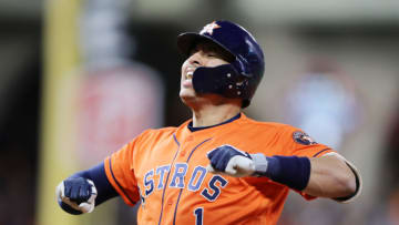 HOUSTON, TEXAS - OCTOBER 30: Carlos Correa #1 of the Houston Astros celebrates after hitting an RBI single against the Washington Nationals during the fifth inning in Game Seven of the 2019 World Series at Minute Maid Park on October 30, 2019 in Houston, Texas. (Photo by Elsa/Getty Images)
