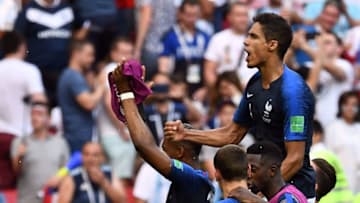 France's defender Raphael Varane (top) and teammates celebratate France's victory at the end of the Russia 2018 World Cup round of 16 football match between France and Argentina at the Kazan Arena in Kazan on June 30, 2018. (Photo by FRANCK FIFE / AFP) / RESTRICTED TO EDITORIAL USE - NO MOBILE PUSH ALERTS/DOWNLOADS (Photo credit should read FRANCK FIFE/AFP/Getty Images)