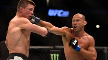 LAS VEGAS, NV - AUGUST 20: (R-L) Donald Cerrone punches Rick Story in their welterweight bout during the UFC 202 event at T-Mobile Arena on August 20, 2016 in Las Vegas, Nevada. (Photo by Jeff Bottari/Zuffa LLC/Zuffa LLC via Getty Images)